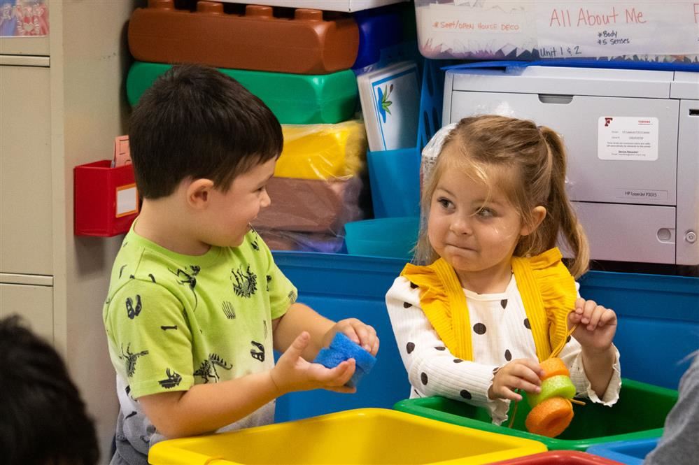 Two students play together